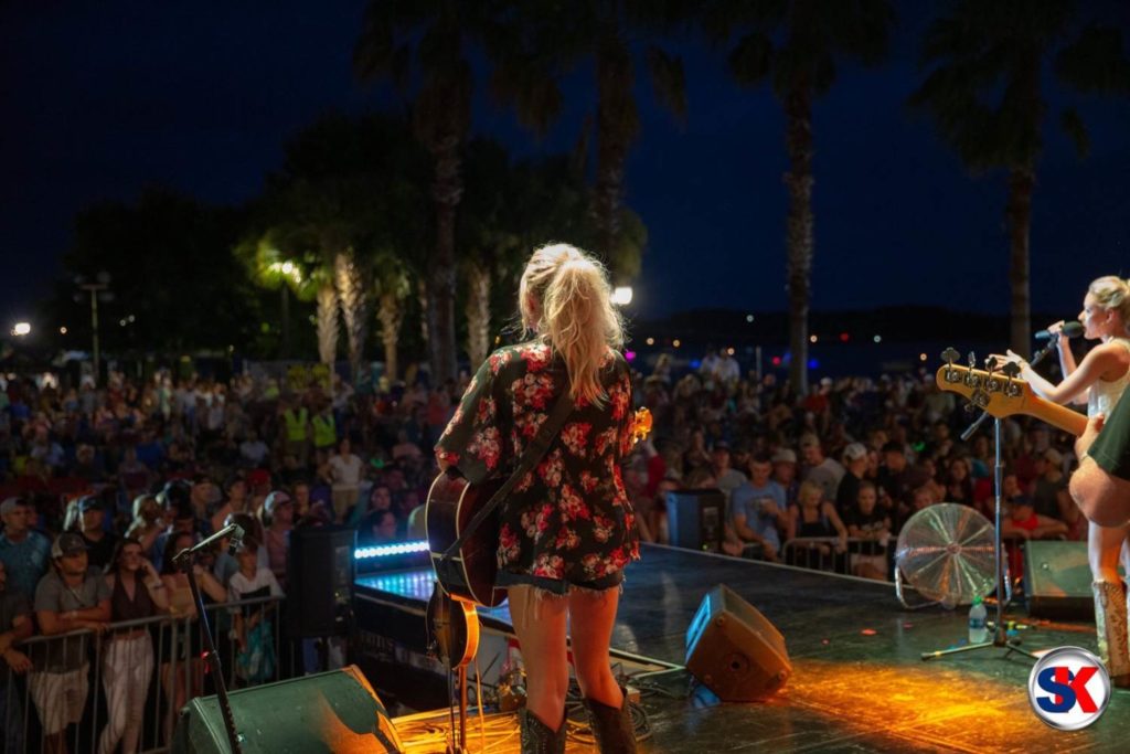 Kristen on stage with Emily Ann Roberts at the Beaufort Water Festival in Beaufort, South Carolina. Photo by SK Productions.