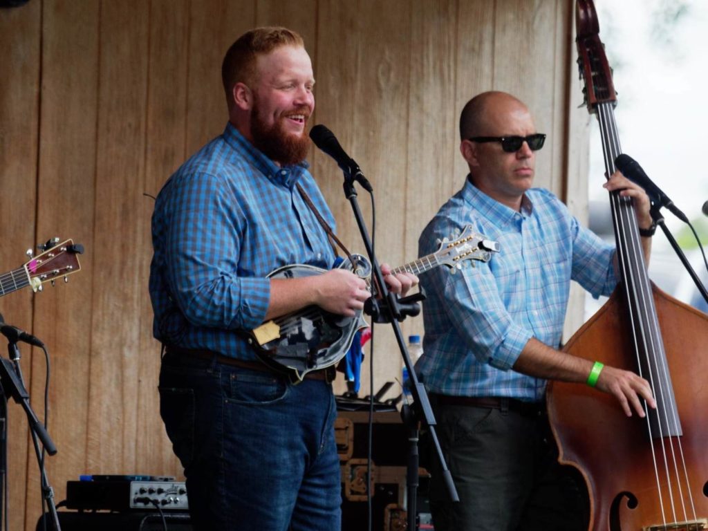 Jesse Smathers performing alongside Barry Reed with Lonesome River Band