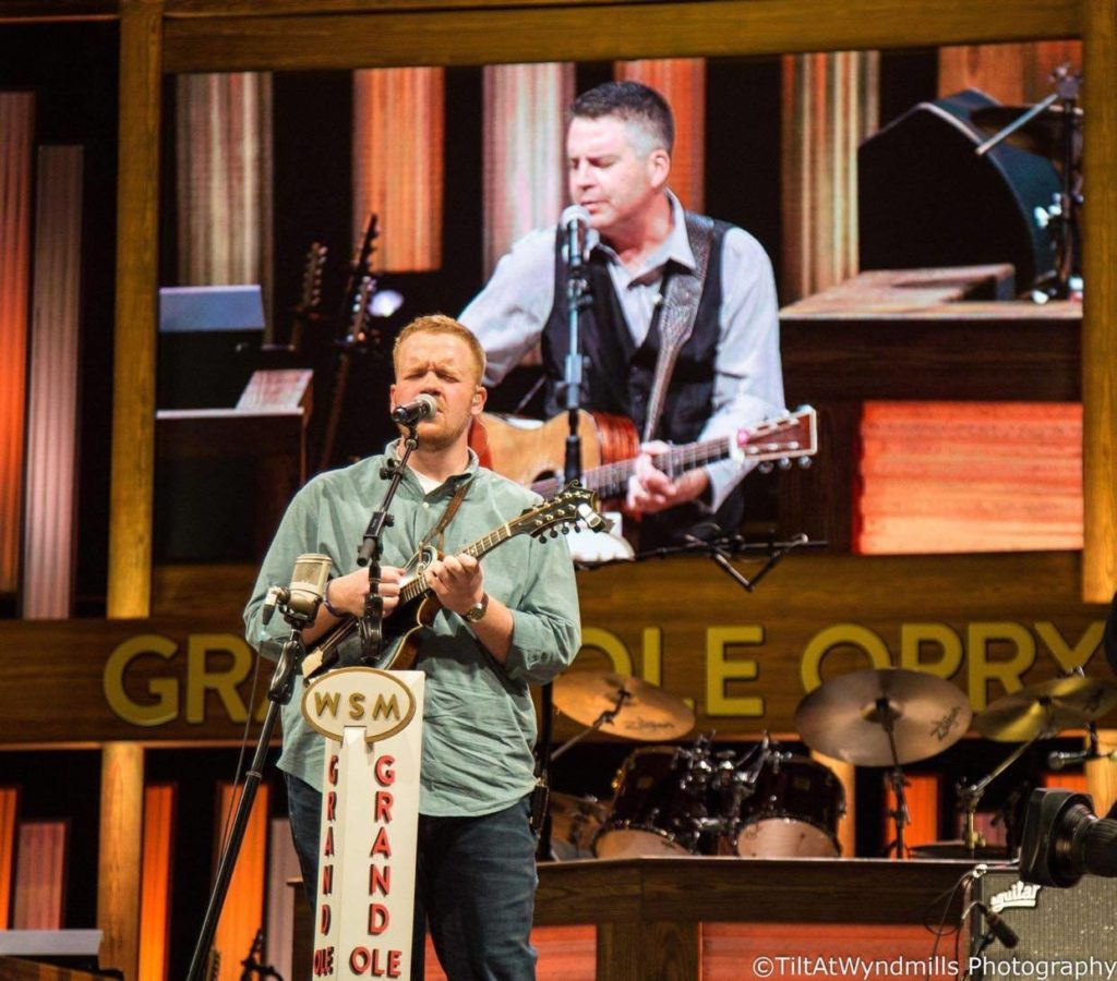 Jesse performing with Lonesome River Band at the Grand Ole Opry. Photo by TiltAtWyndmills photography.