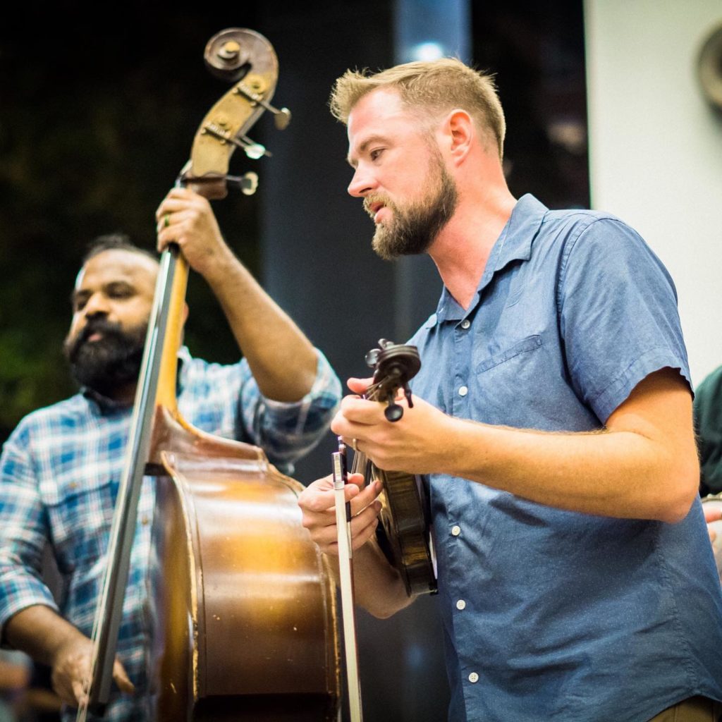 Sav performing alongside Unspoken Tradition bandmate Tim Gardner at the 2019 IBMA World of Bluegrass Convention